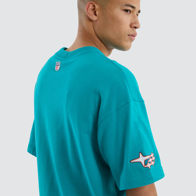 Model wears Miami Dolphins Coach Tee Aqua T-Shirts in Green - Image 7