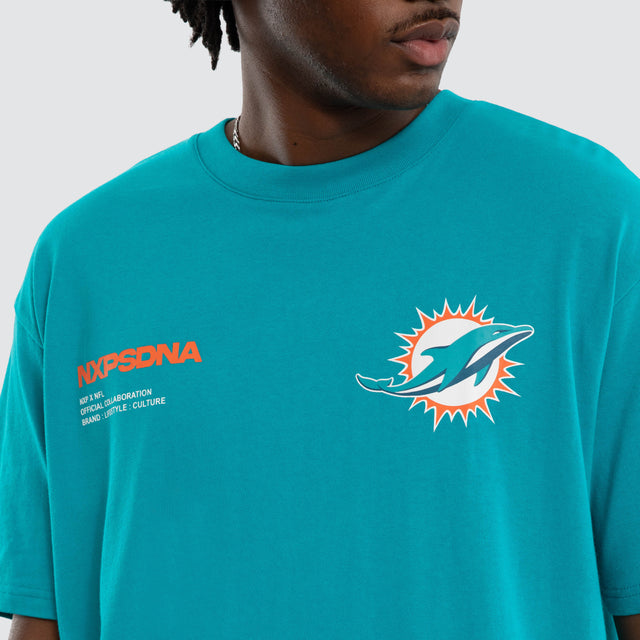 Model wears Miami Dolphins Driven Tee Aqua T-Shirts in Green - Image 7