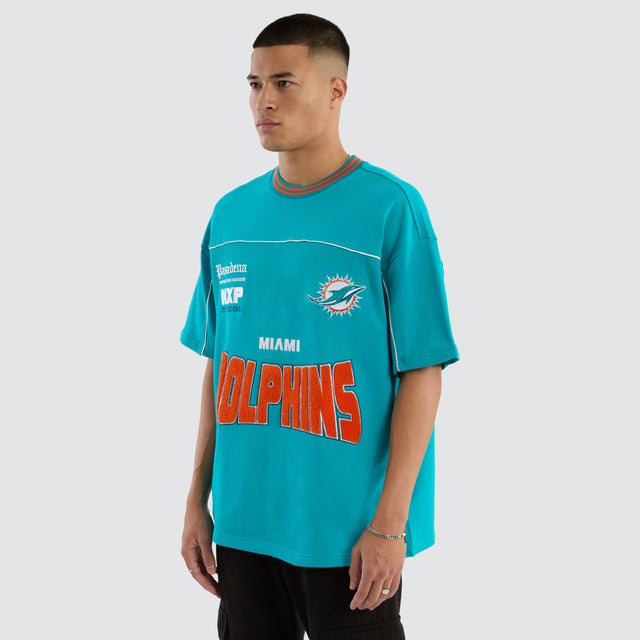 Model wears Miami Dolphins Zone Tee Aqua T-Shirts in Green - Image 5