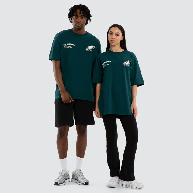Model wears Philadelphia Eagles Driven Tee Midnight Green T-Shirts in Green - Image 4