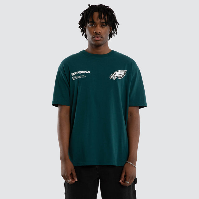 Model wears Philadelphia Eagles Driven Tee Midnight Green T-Shirts in Green - Image 5