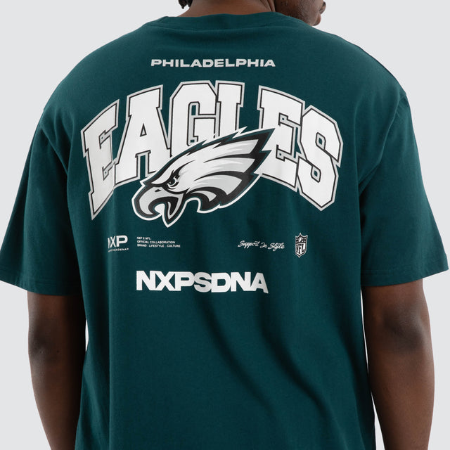 Model wears Philadelphia Eagles Driven Tee Midnight Green T-Shirts in Green - Image 3