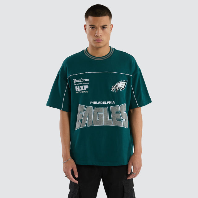 Model wears Philadelphia Eagles Zone Tee Midnight Green T-Shirts in Green - Image 1
