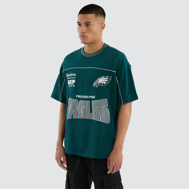 Model wears Philadelphia Eagles Zone Tee Midnight Green T-Shirts in Green - Image 5
