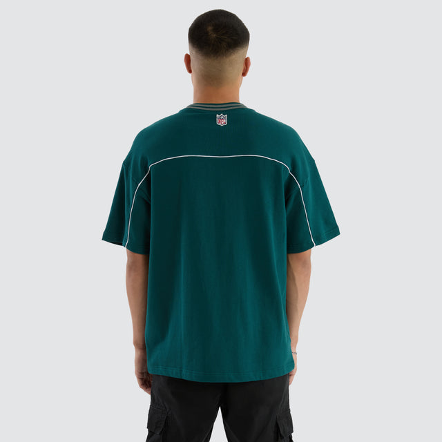 Model wears Philadelphia Eagles Zone Tee Midnight Green T-Shirts in Green - Image 6