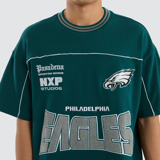 Model wears Philadelphia Eagles Zone Tee Midnight Green T-Shirts in Green - Image 3