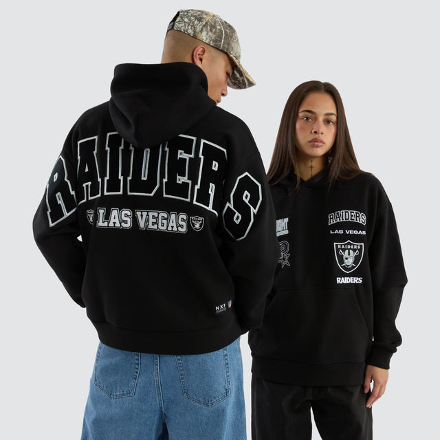 Model wears Las Vegas Raiders Surround Hoodie Jet Black Hoodies in Black - Image 1