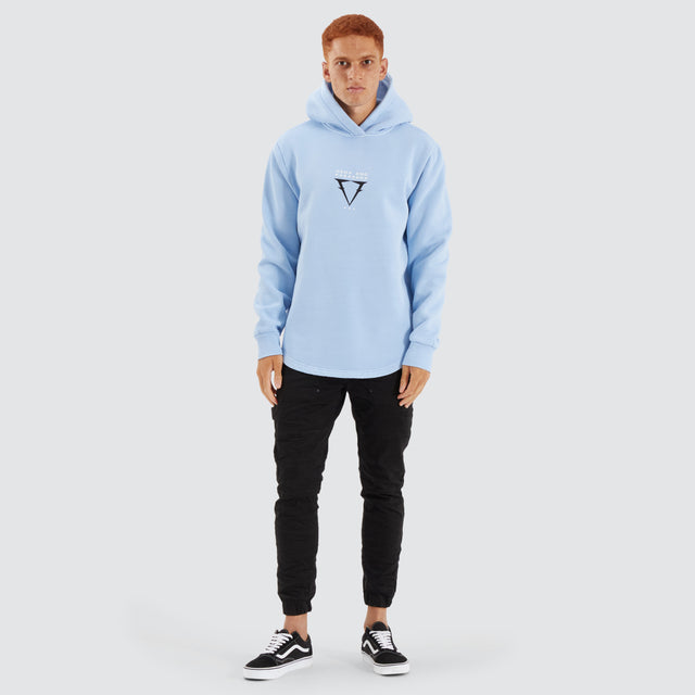 Model Wears Data Dual Curved Hoodie Pigment Placid Blue Hoodies in Blue - Image 4