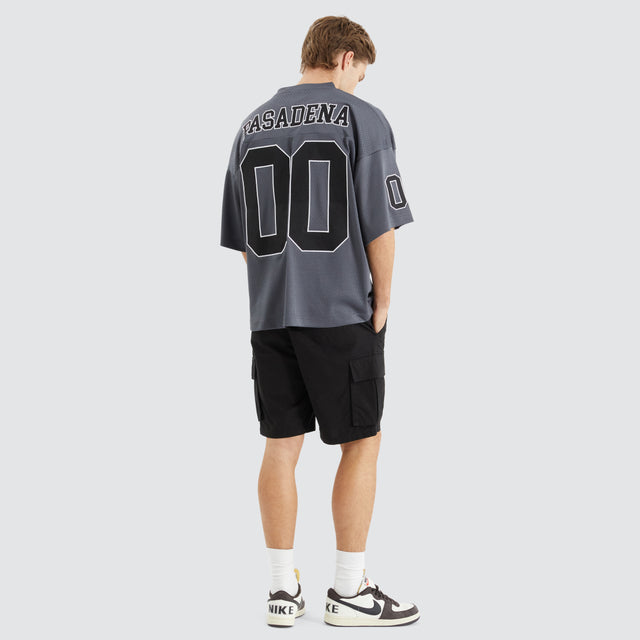Model Wears Dayton Mesh Training Jersey Asphalt T-Shirts in Grey - Image 6