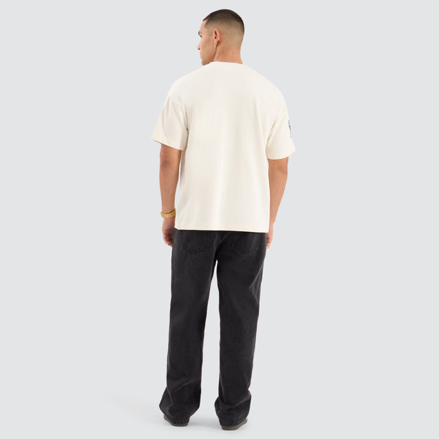 Model Wears Bounty Loopback Raptor Tee Tofu T-Shirts in Off-White - Image 2