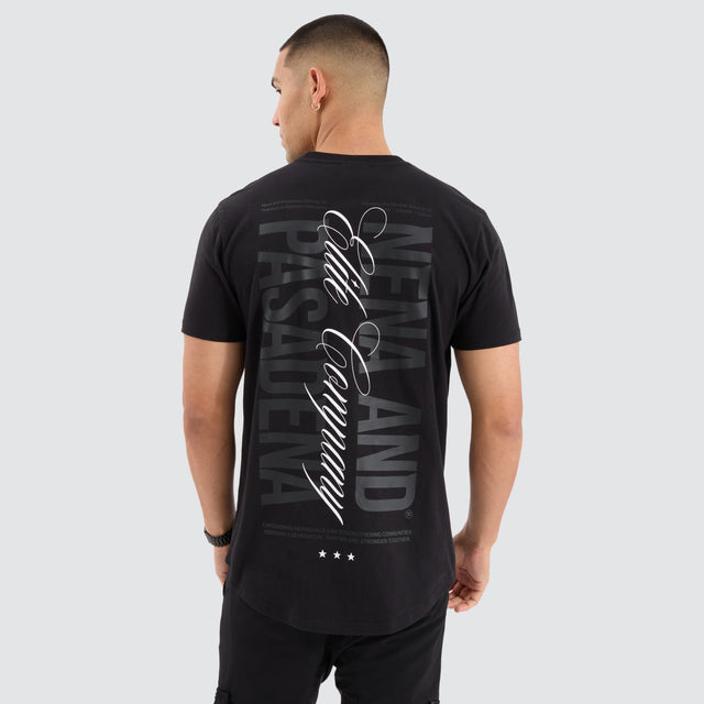 Model Wears Spur Dual Curved Tee Jet Black T-Shirts in Black - Image 1