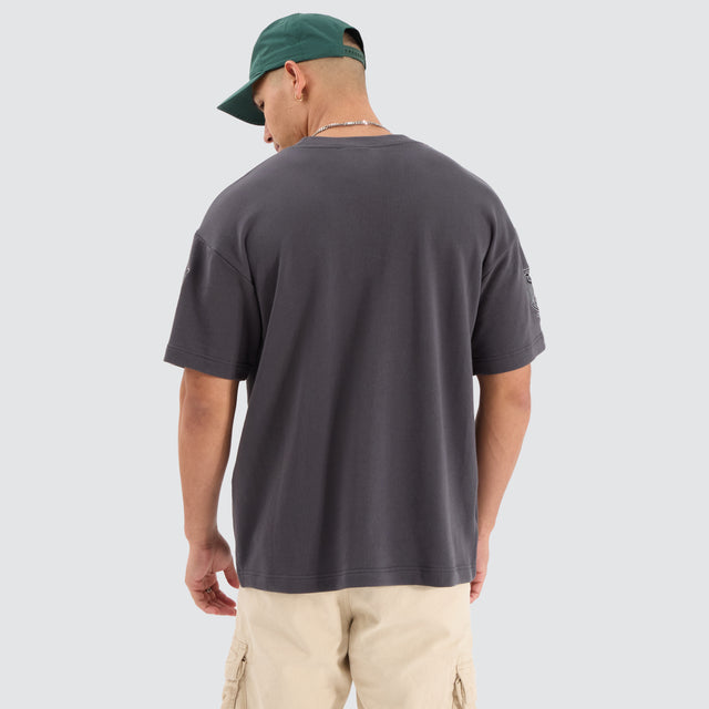 Model Wears Maverick Loopback Raptor Tee Asphalt T-Shirts in Grey - Image 4