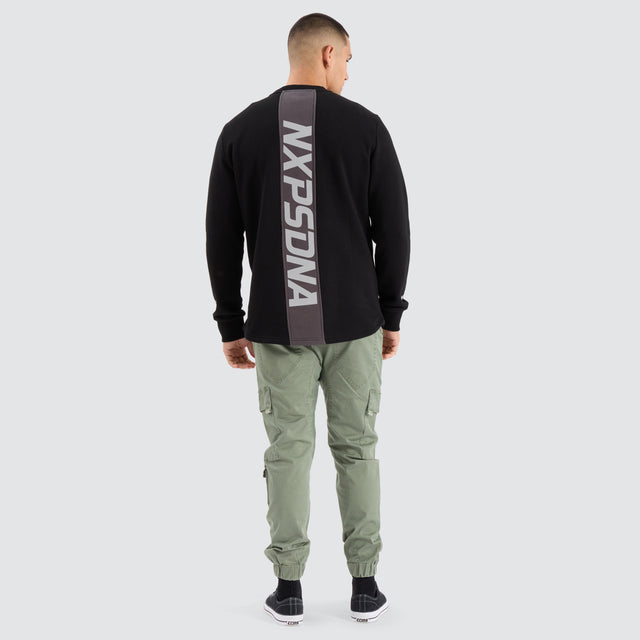 Model Wears Native Dual Curved Sweater Jet Black/Asphalt Jumpers in Black - Image 4