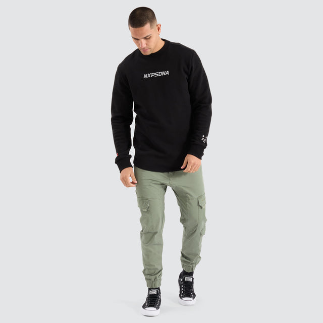 Model Wears Native Dual Curved Sweater Jet Black/Asphalt Jumpers in Black - Image 2