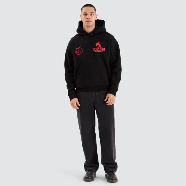 Model Wears Rodeo Box Fit Hoodie Jet Black Hoodies in Black - Image 5
