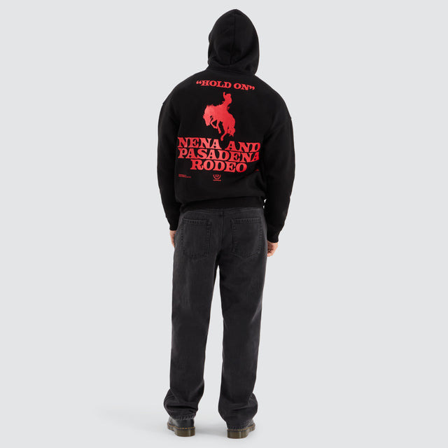 Model Wears Rodeo Box Fit Hoodie Jet Black Hoodies in Black - Image 3