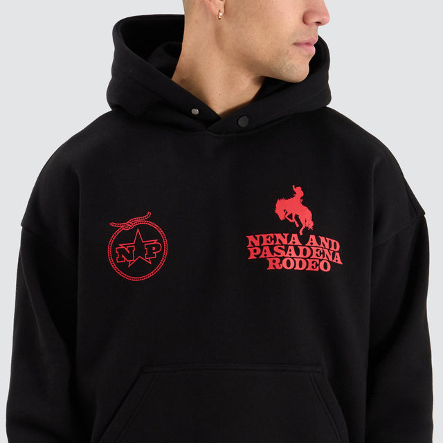 Model Wears Rodeo Box Fit Hoodie Jet Black Hoodies in Black - Image 4