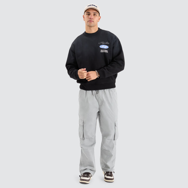 Model Wears Reservation Box Fit Sweater Jet black Jumpers in Black - Image 3