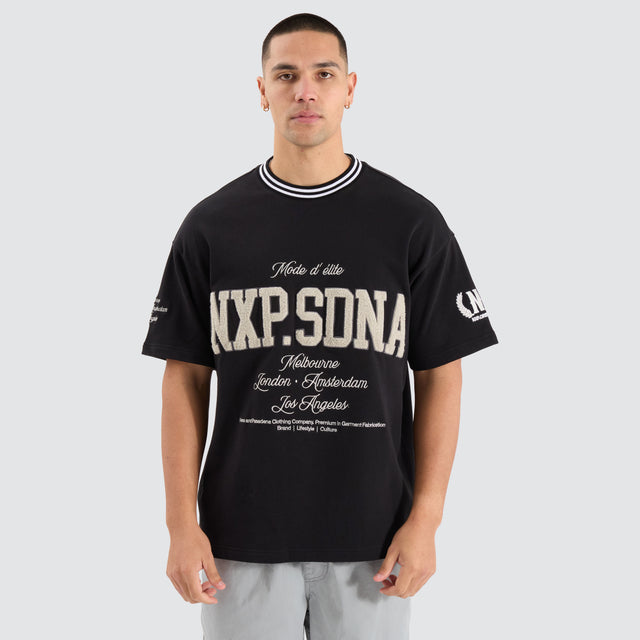 Model Wears Ante Loopback Raptor Tee Jet Black T-Shirts in Black - Image 1