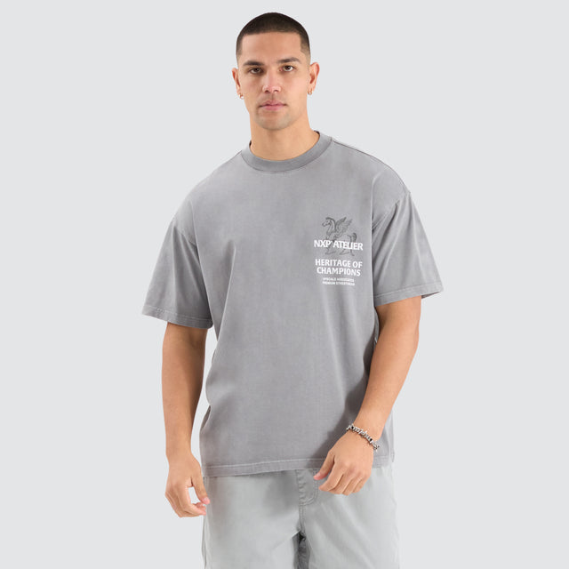 Model Wears Heritage Raptor Tee Pigment Neutral Grey T-Shirts in Grey - Image 2