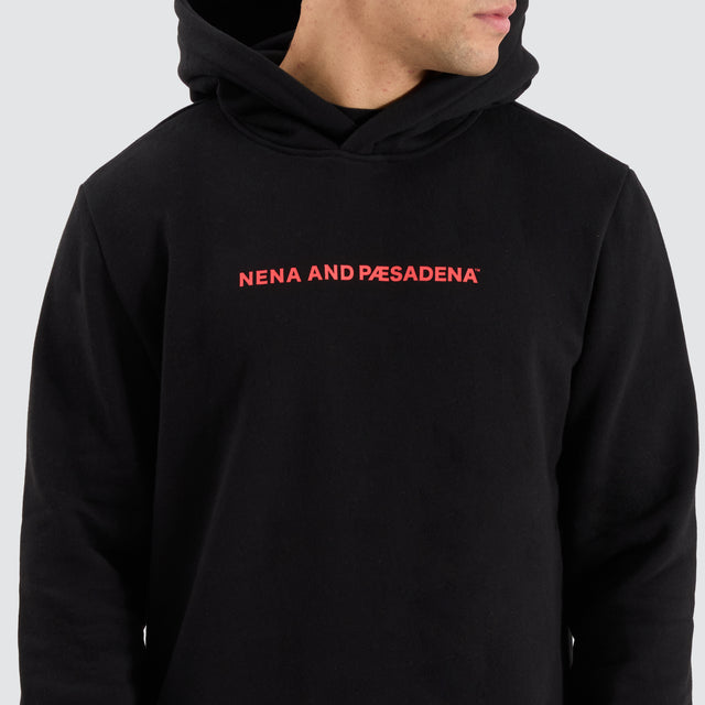 Model Wears Risk Dual Curved Hoodie Jet Black Hoodies in Black - Image 5