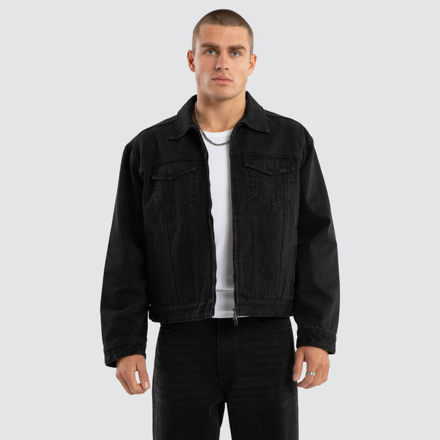 Model Wears Divide Denim Jacket Jet black Jackets in Black - Image 1