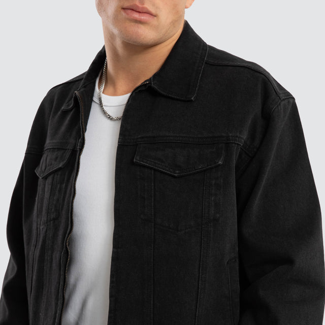 Model Wears Divide Denim Jacket Jet black Jackets in Black - Image 2