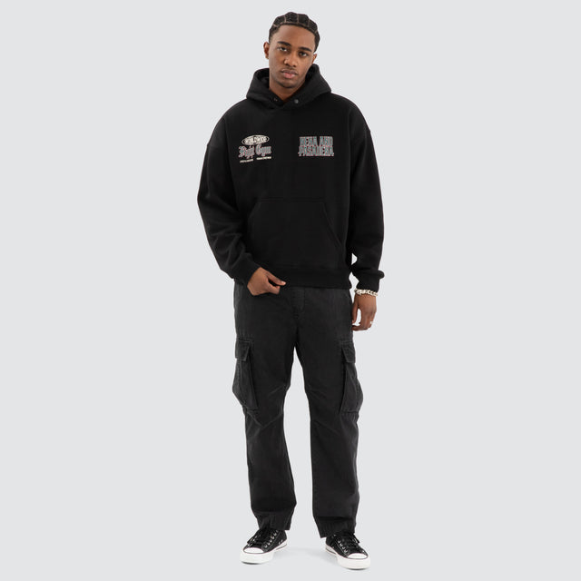 Model Wears Battle Box Fit Hoodie Jet black Hoodies in Black - Image 2