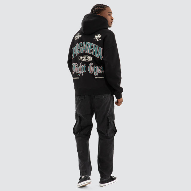 Model Wears Battle Box Fit Hoodie Jet black Hoodies in Black - Image 4