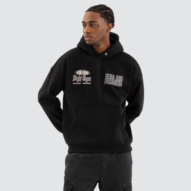 Model Wears Battle Box Fit Hoodie Jet black Hoodies in Black - Image 1