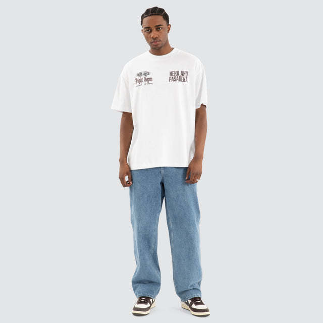 Model Wears Rattle Raptor Tee Optical White T-Shirts in White - Image 2