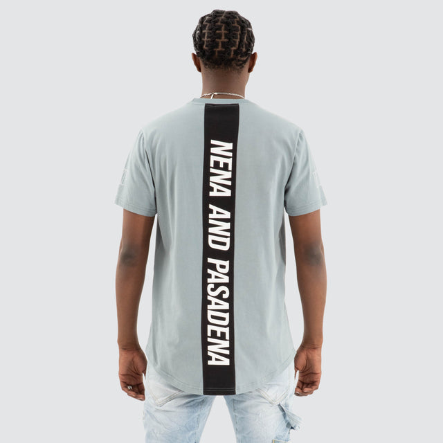 Model Wears Harbor Dual Curved Tee Lead Blue/Black T-Shirts in Blue - Image 2