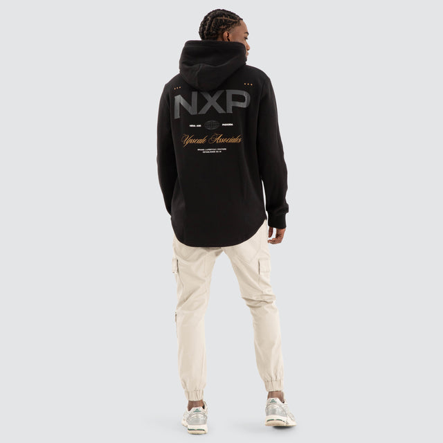 Model Wears Wild Dual Curved Hoodie Jet black Hoodies in Black - Image 4