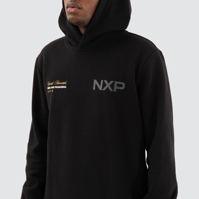Model Wears Wild Dual Curved Hoodie Jet black Hoodies in Black - Image 5