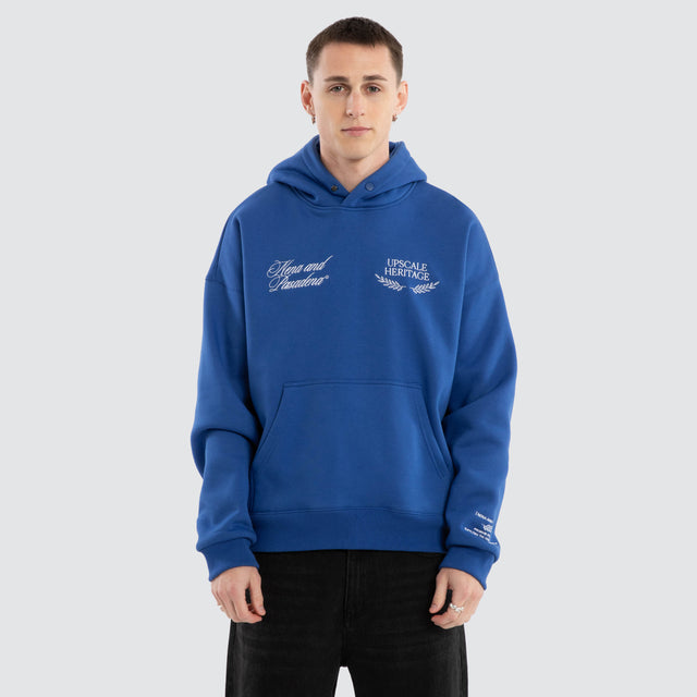 Model Wears Etiquette Box Fit Hoodie Cobalt Blue Hoodies in Blue - Image 1