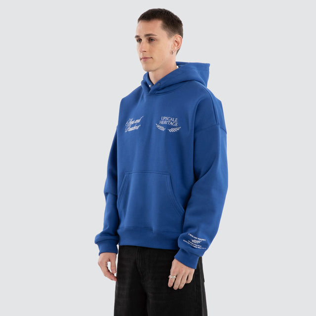 Model Wears Etiquette Box Fit Hoodie Cobalt Blue Hoodies in Blue - Image 3