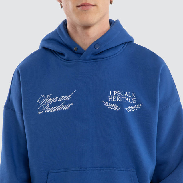 Model Wears Etiquette Box Fit Hoodie Cobalt Blue Hoodies in Blue - Image 6