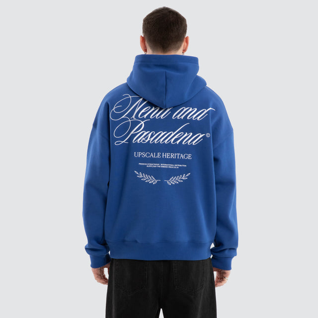 Model Wears Etiquette Box Fit Hoodie Cobalt Blue Hoodies in Blue - Image 4