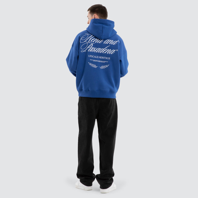 Model Wears Etiquette Box Fit Hoodie Cobalt Blue Hoodies in Blue - Image 2
