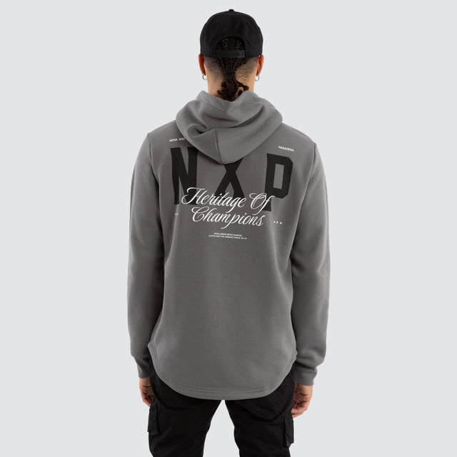 Model Wears Crossover Dual Curved Hoodie Charcoal Hoodies in Grey - Image 1