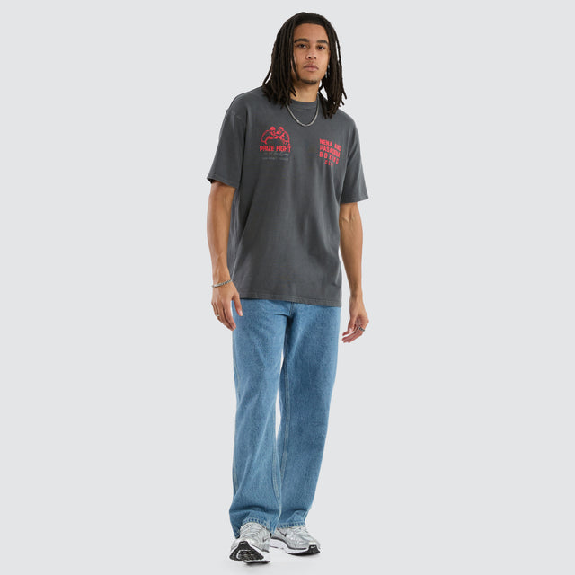 Model wears Mark Box Fit Tee Pigment Asphalt T-Shirts in Grey - Image 6