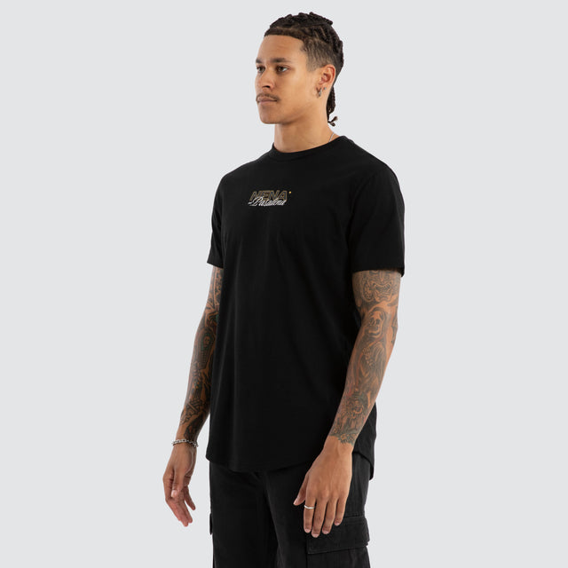 Model wears Veered Curved Hem Tee Jet Black T-Shirts in Black - Image 3