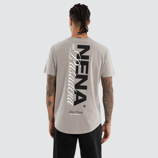 Model wears Veered Curved Hem Tee Pigment Paloma Grey T-Shirts in Grey - Image 1