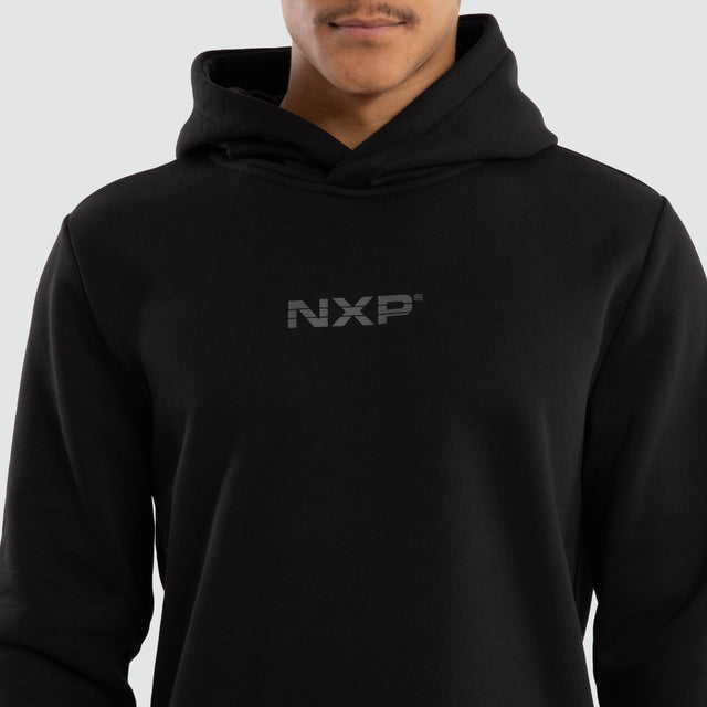 Model wears Black Line Curved Hem Hoodie Jet Black Hoodies in Black - Image 6