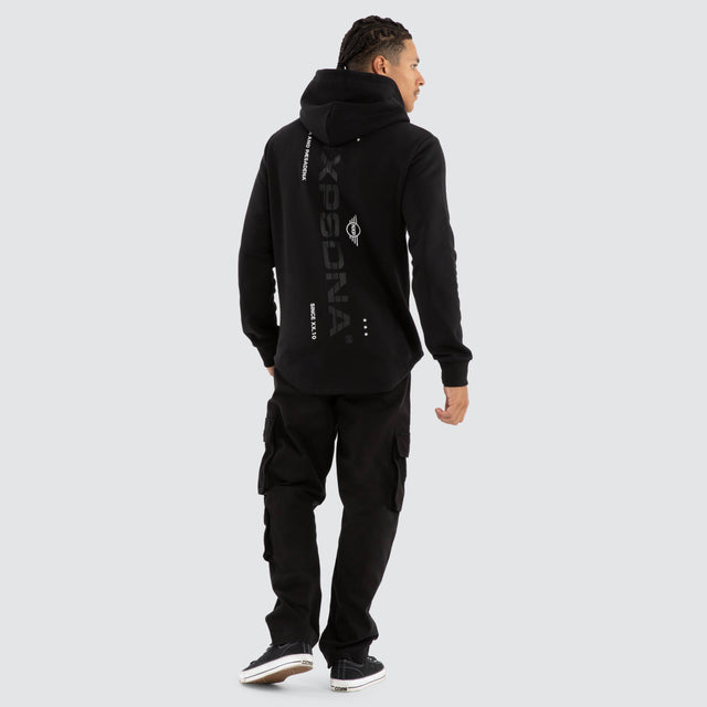 Model wears Black Line Curved Hem Hoodie Jet Black Hoodies in Black - Image 4