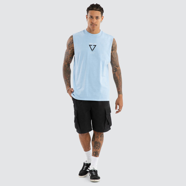 Model wears Warping Relaxed Muscle Pigment Blue Bell Muscle Tees in Blue - Image 5