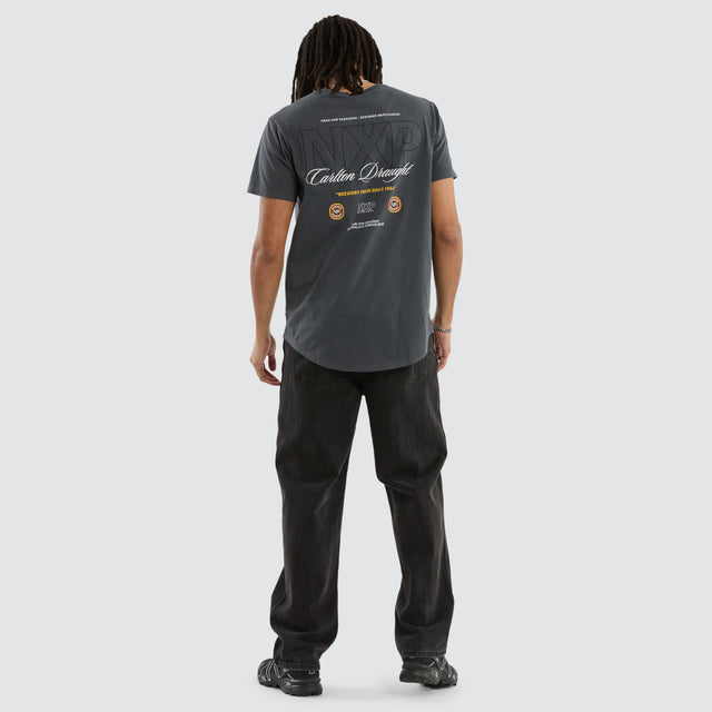 Model wears Carlton Draught General Dual Curved Tee Pigment Asphalt T-Shirts in Grey - Image 5