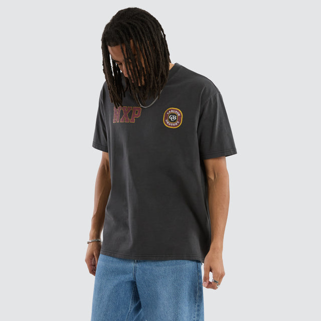 Model wears Carlton Draught Revival Box Fit Tee Pigment Black T-Shirts in Black - Image 3