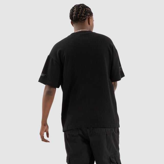 Model Wears Power Loopback Raptor Tee Jet Black T-Shirts in Black - Image 4