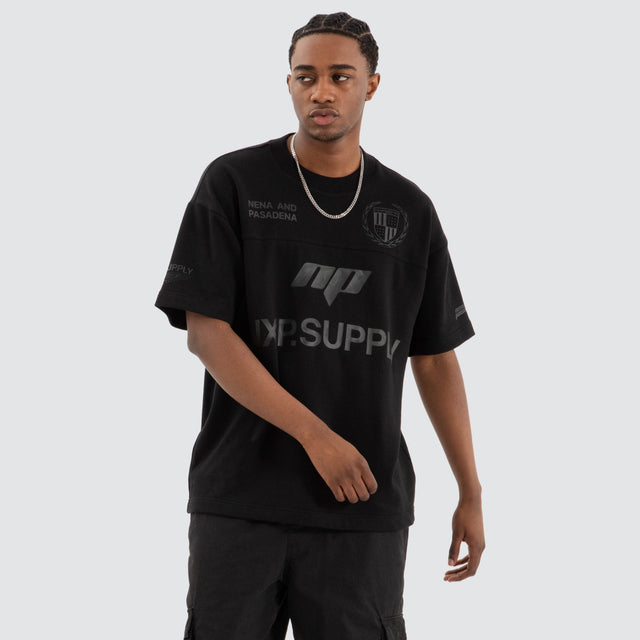 Model Wears Power Loopback Raptor Tee Jet Black T-Shirts in Black - Image 1